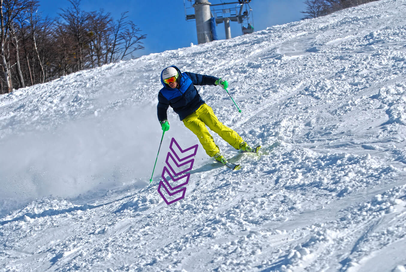 Skier initiating a turn on a steep slope - moving center of mass forward and down the valley