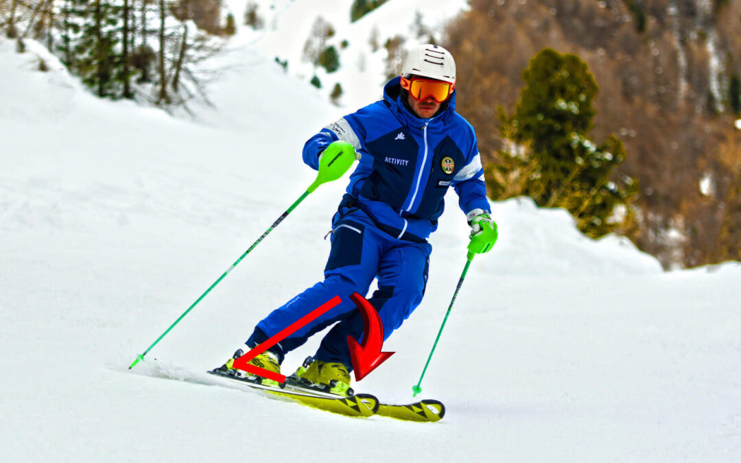 Italian Ski Instructor showing ankle flexion at the start of the turn